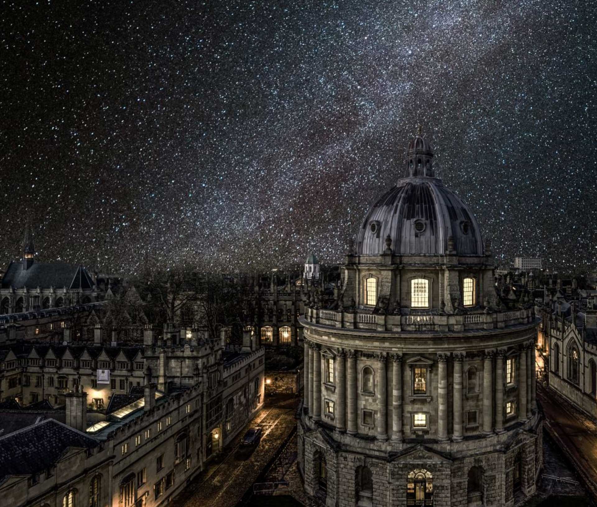 A night time view of Oxford's Radcliffe Camera beneath a starfield