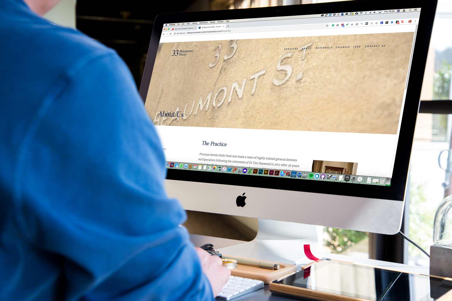 The 33 Beaumont Street website displayed on an iMac
