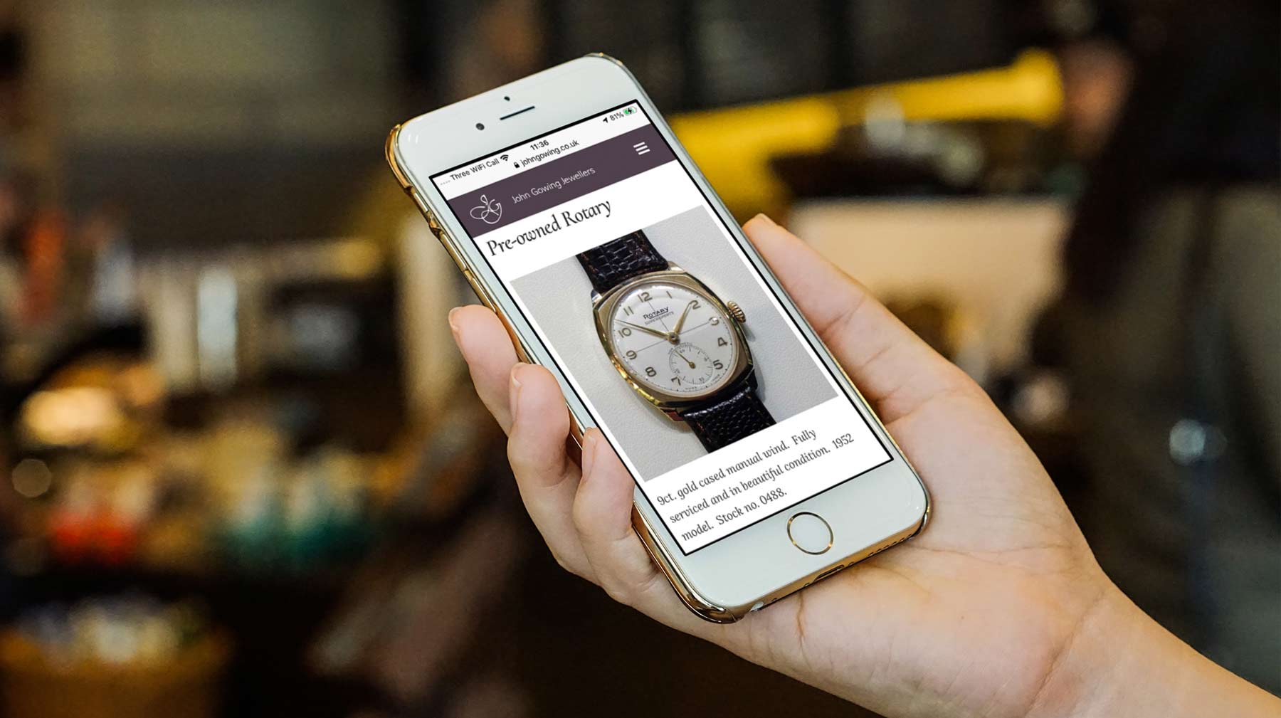 A product on the John Gowing Jewellery website displayed on a smartphone