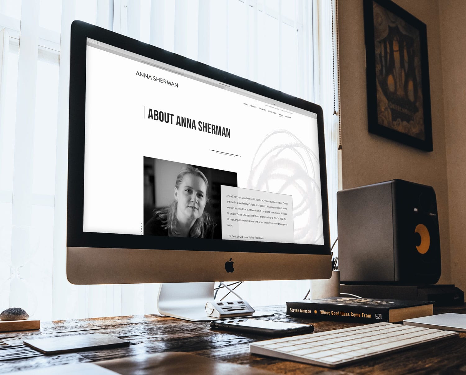 The Anna Sherman website displayed on an iMac
