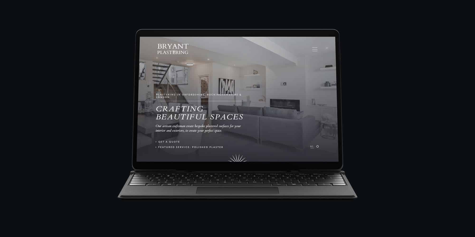 The Bryant Plastering website home page displayed on a Surface laptop
